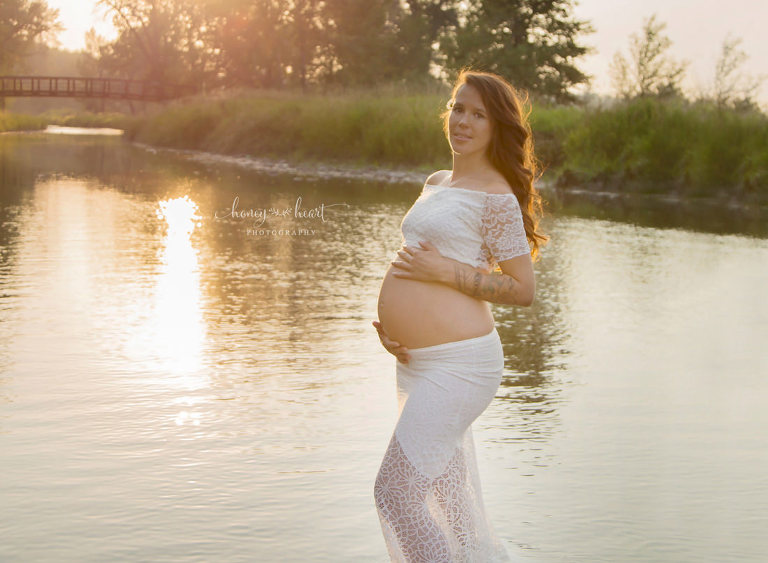 pregnant mom standing in river Calgary park maternity water photo