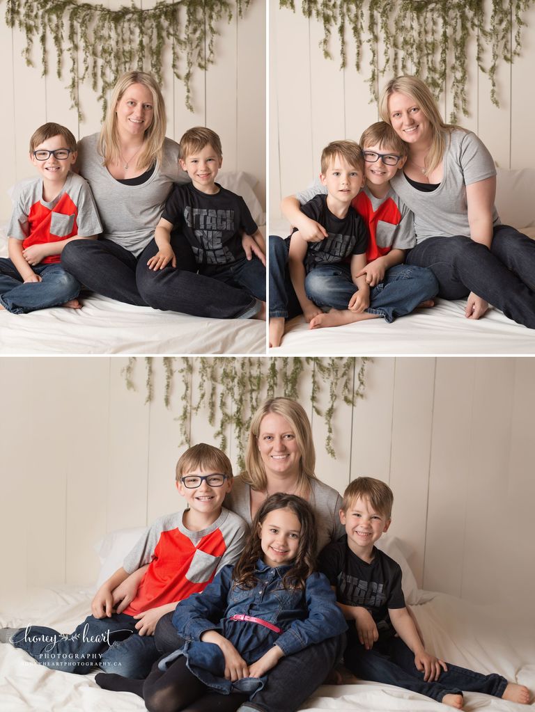 Mom posing with her two sons and family photoh with her 3 children two boys and one girl Calgary Childrens photographer Studio childhood photography session