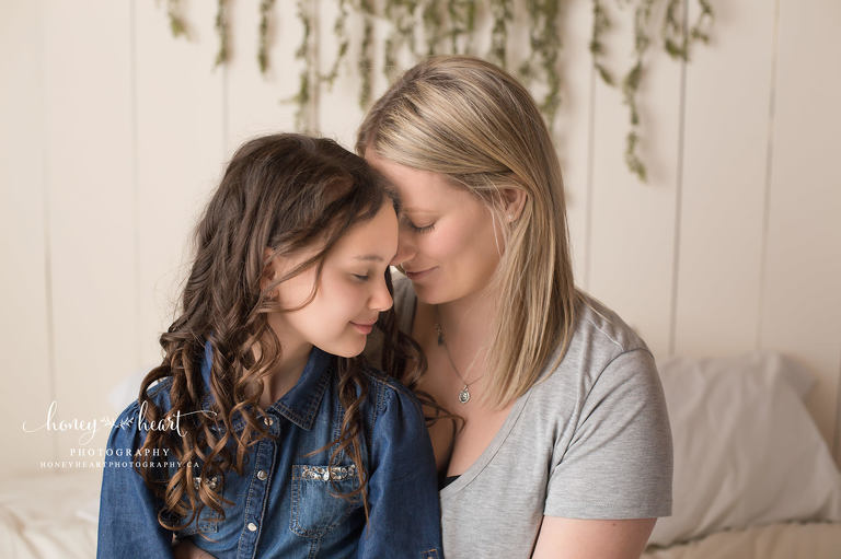 Mother and daughter pose family photographers calgary AB